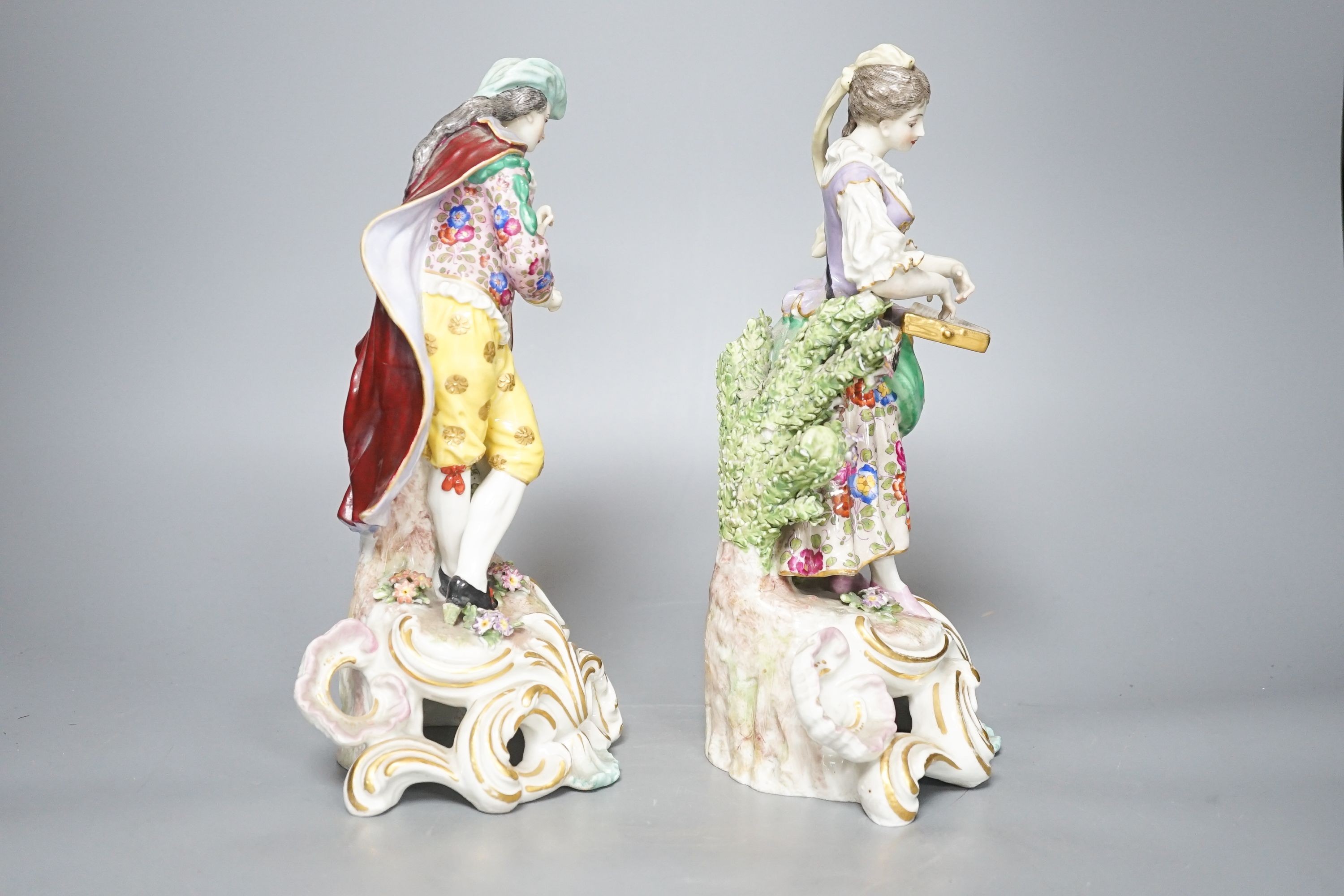 Two Continental porcelain figures, a lady and a gent 27cm